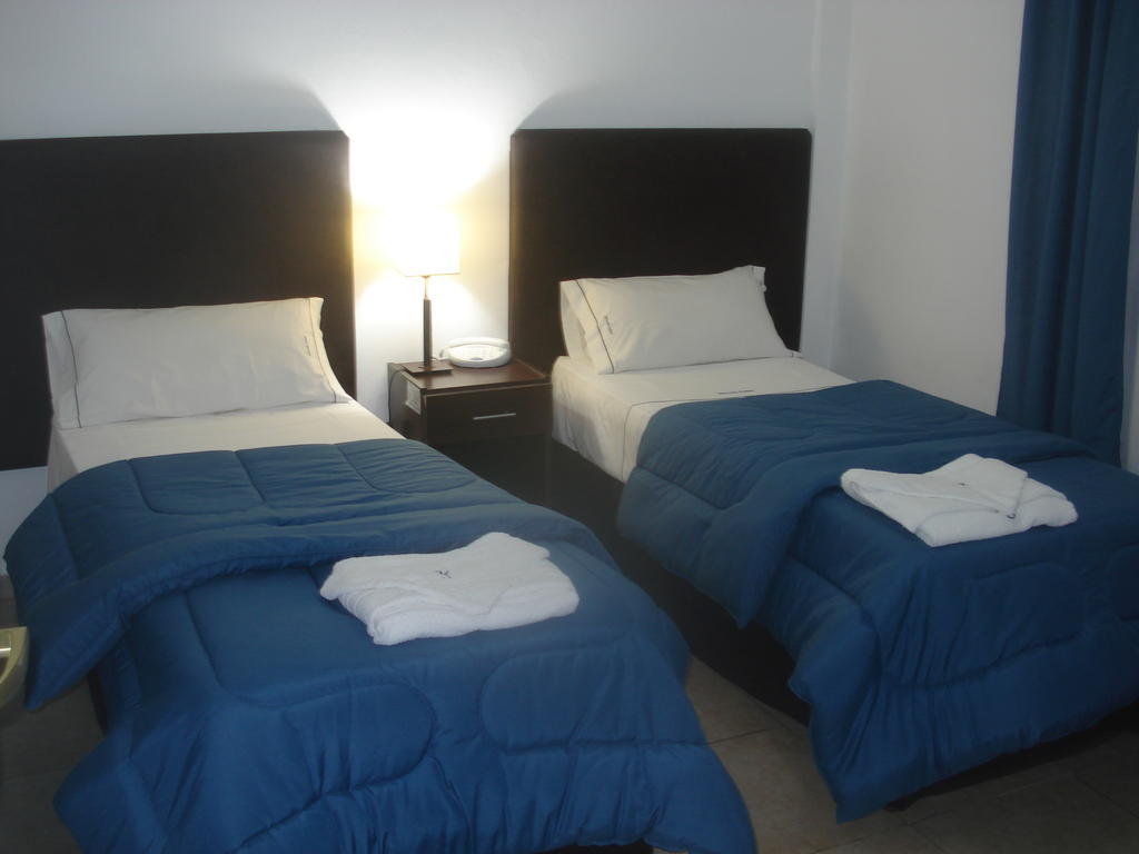 Morada Suites Campana Kamer foto