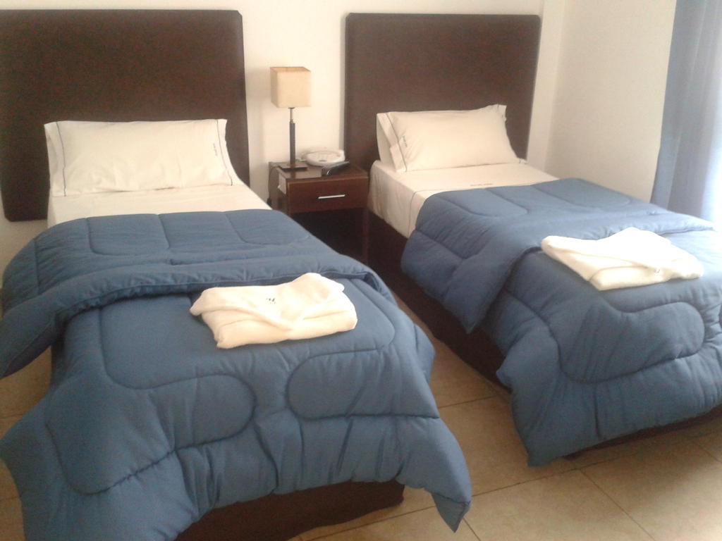 Morada Suites Campana Kamer foto